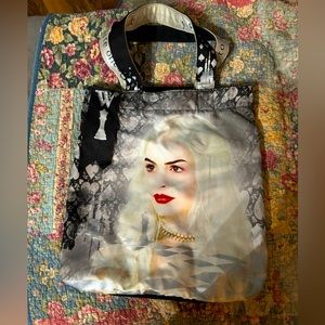 Alice in Wonderland bag in like new condition.